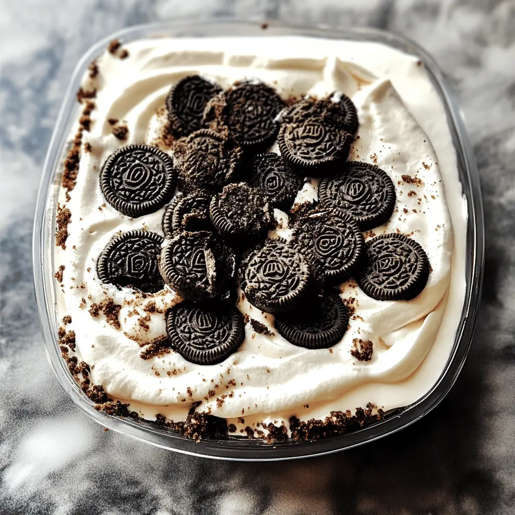 This Heavenly Oreo Dessert is a delightful no-bake treat that's perfect for any occasion! Layered with creamy cheesecake filling, rich chocolate, and crushed Oreo cookies, it's sure to please any sweet tooth. Save this pin to whip up this delicious dessert for your next gathering or family night—it’s a crowd favorite!