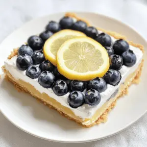 Brighten your day with this Lemon Blueberry Delight! Combining zesty lemon and juicy blueberries, this dessert is a refreshing treat that's perfect for warm weather gatherings or a simple after-dinner sweet. Easy to make and delightful to share, don’t forget to save this recipe for your next celebration or anytime you want a taste of summer!