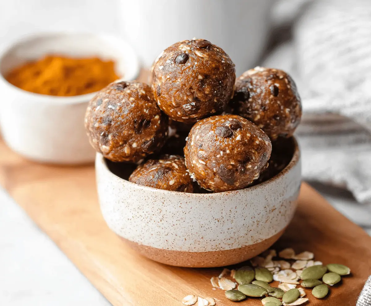 Delicious Espresso Pumpkin Protein Balls on a white plate with fall-themed decorations, perfect for a healthy snack or energy boost.