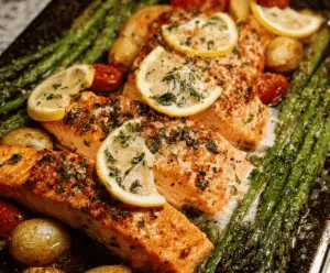 Delicious oven-roasted salmon fillet with herbs on a baking tray