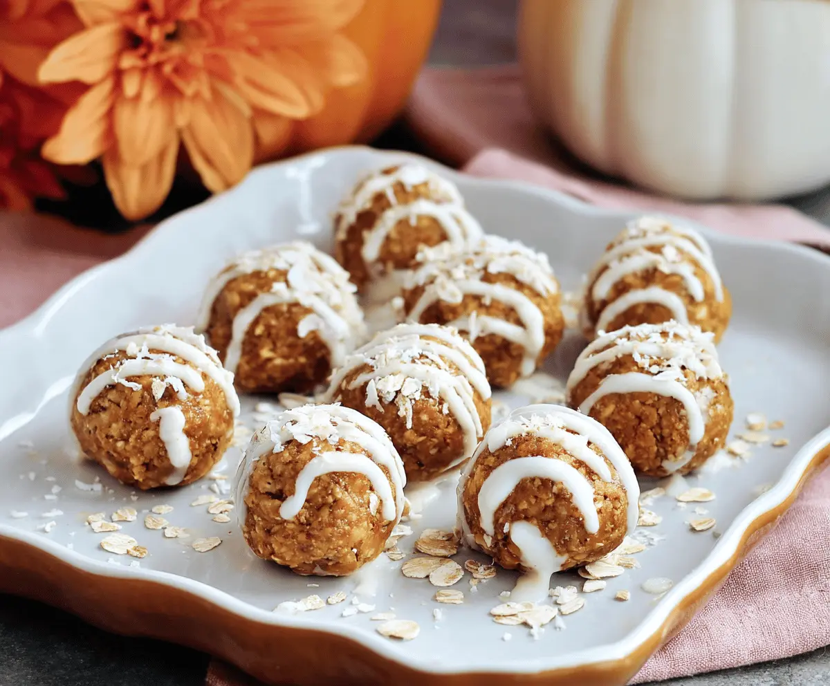 Delicious Pumpkin Protein Snowball Bites with shredded coconut and chocolate drizzle on a plate, healthy snack and dessert option