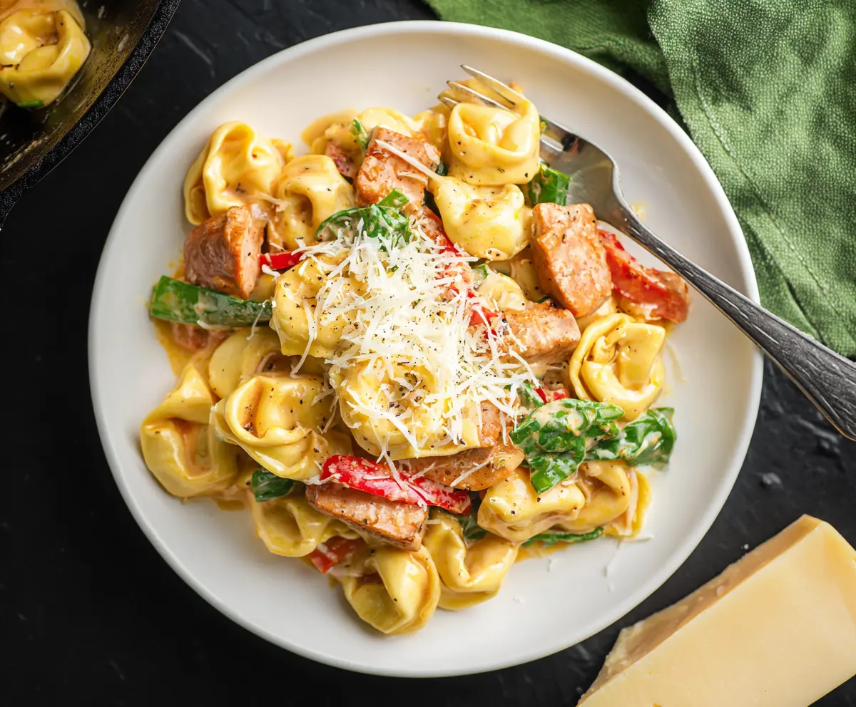 Delicious Cajun Chicken Tortellini in creamy sauce with herbs