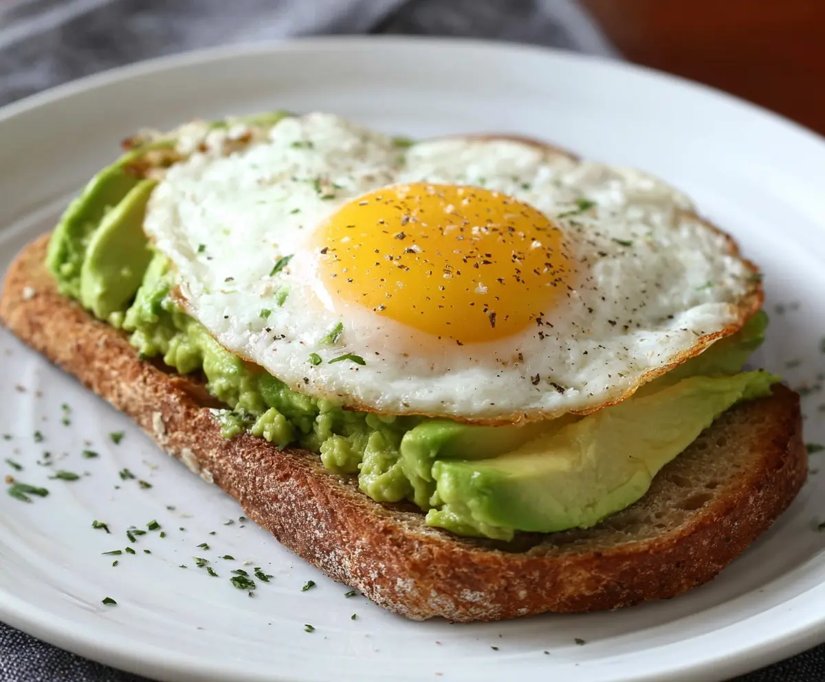 Delicious egg and avocado toast with fresh ingredients for a healthy breakfast