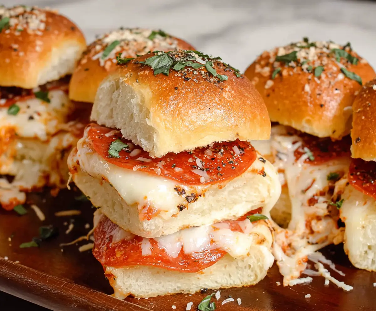 Delicious pepperoni pizza sliders with melted cheese and crispy crust.