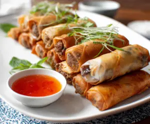 Delicious beef spring rolls with fresh vegetables wrapped in crispy rice paper.