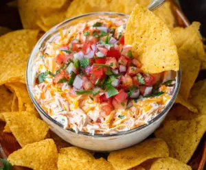 Cream Cheese Salsa Dip served with tortilla chips, perfect for parties and gatherings.